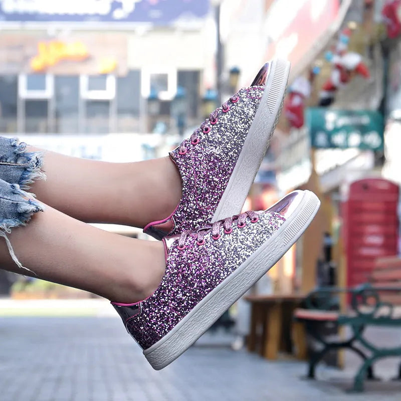 Women's black, pink and gold sequin casual low-top lace-up shoes with round toe and rubber sole.