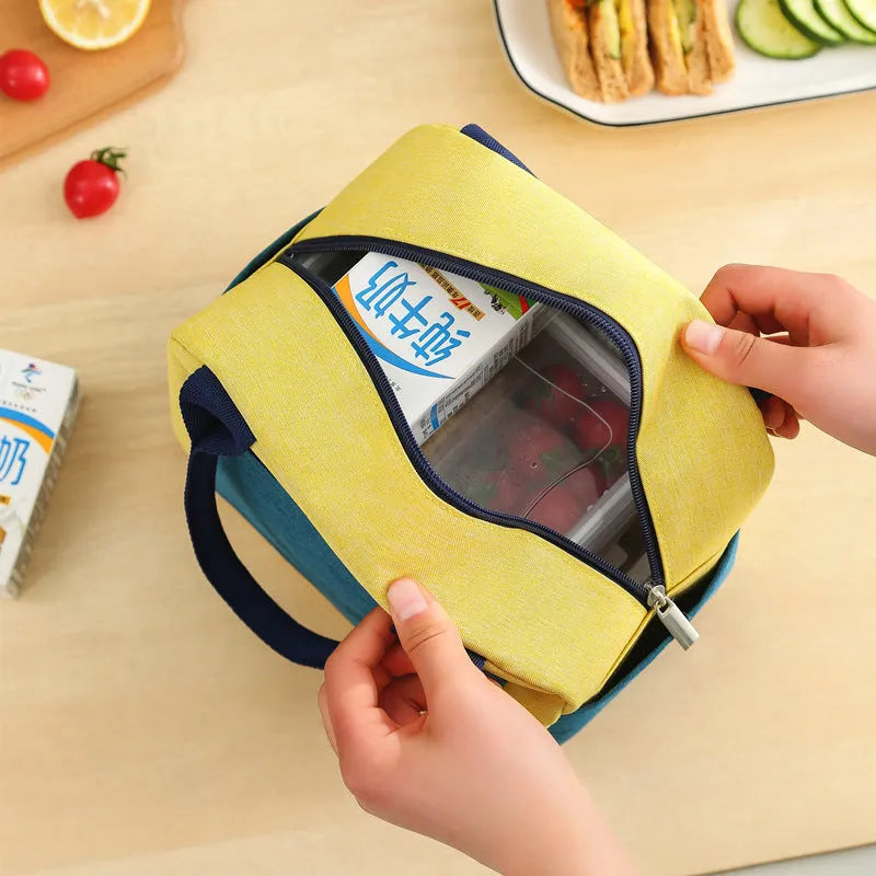 Blue waterproof Oxford cloth lunch bag with aluminium foil insulation.