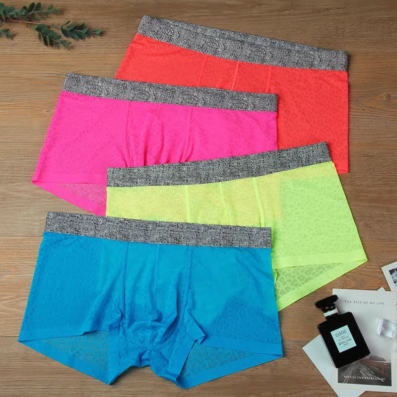 Men's seamless lace boxer briefs in low-waist design, showing thin transparent fabric.