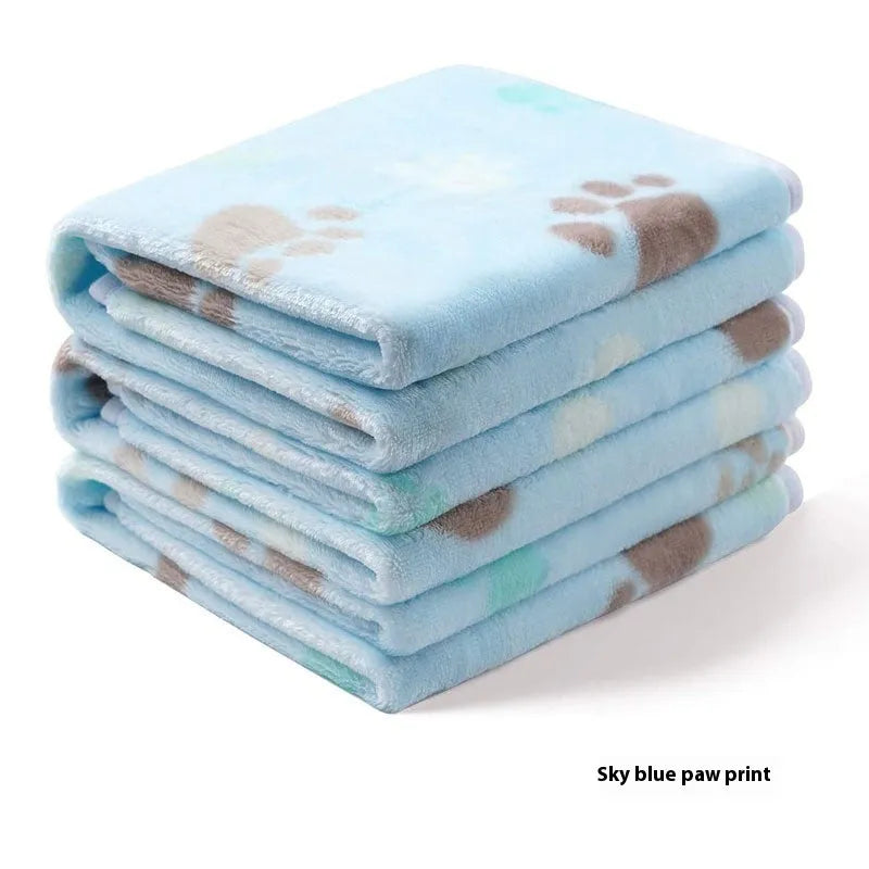 Three flannel coral fleece pet blankets in dark grey, camel, and sky blue stacked together showing size S