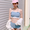 Women's conservative split leg one-piece swimsuit with suspender straps in solid colour