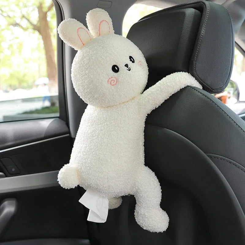 Soft plush car headrest tissue box holder in a cute animal character style.