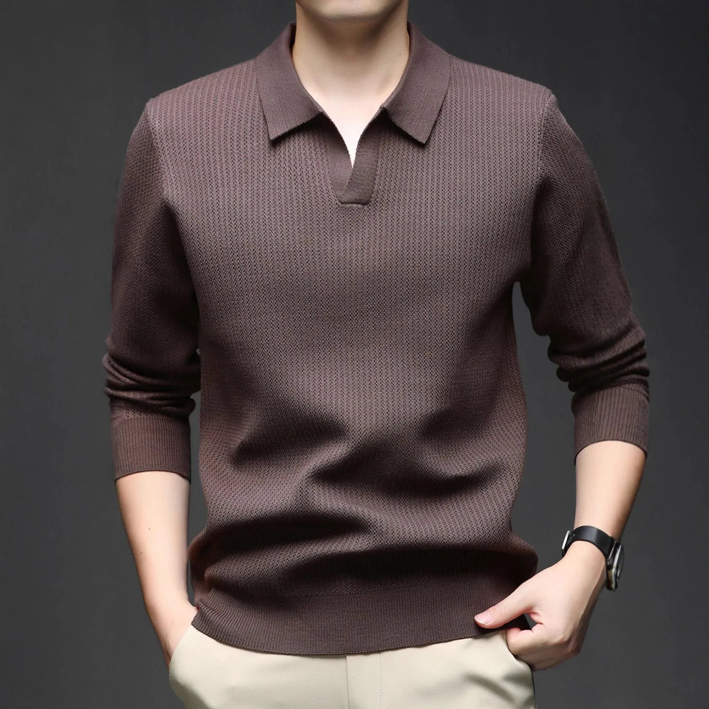 Men's loose-fitting casual pullover sweater in a polyester viscose nylon blend, shown in green.