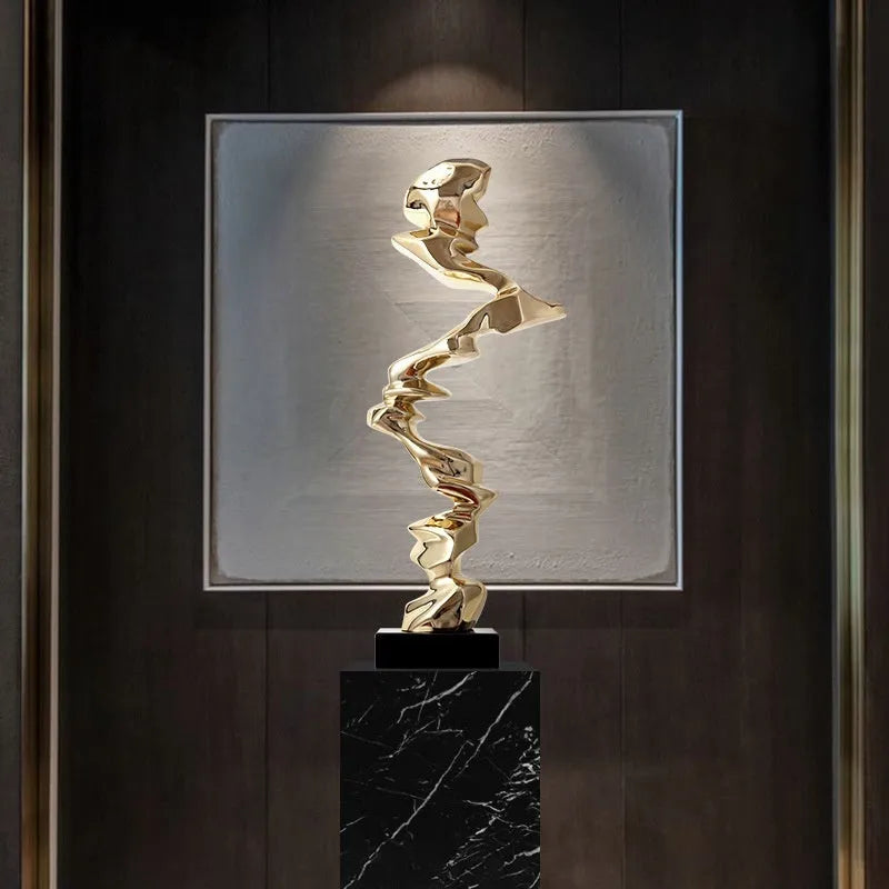 Abstract resin ornament in modern style with metallic finish for hallway or living room decoration