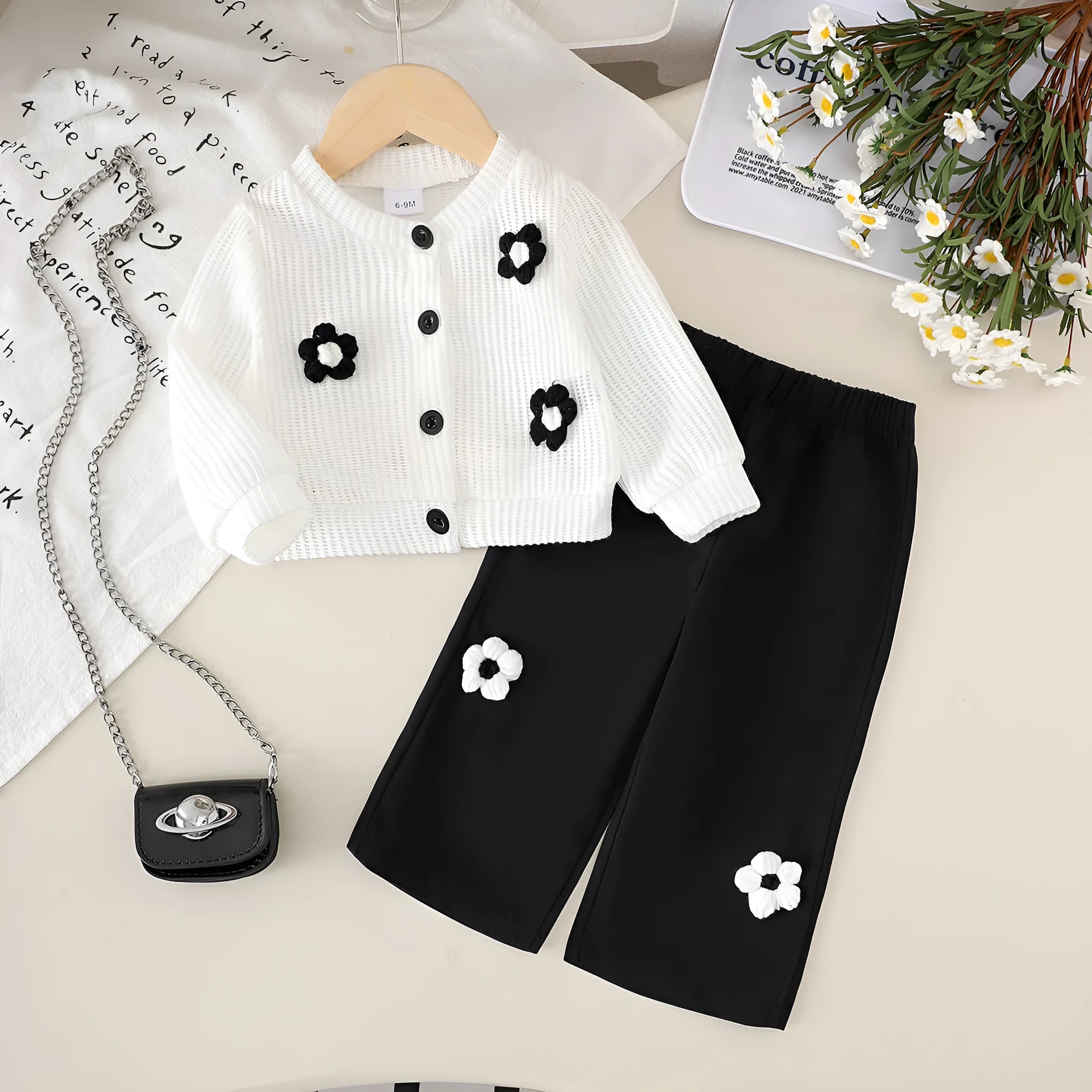 White cotton flower print long sleeve top and black trousers baby outfit set