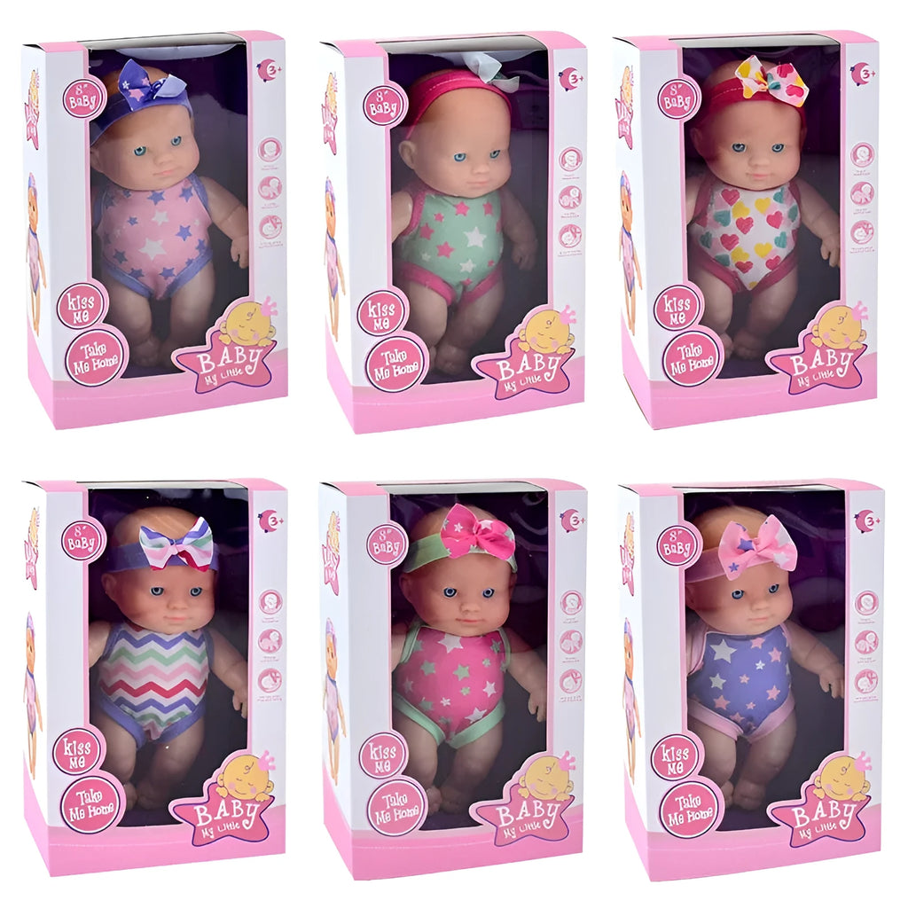 Vinyl baby figurine doll in display with colour variations and measurement scale