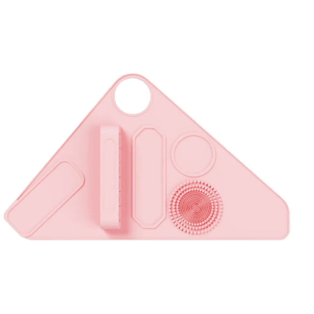 Silicone makeup auxiliary hand strap in four colours: purple, pink, blue, and black, on a light background showing regular size and flexible material.