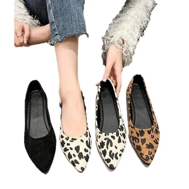 Leopard print women's flat pumps with pointed toe and low heel on rubber sole