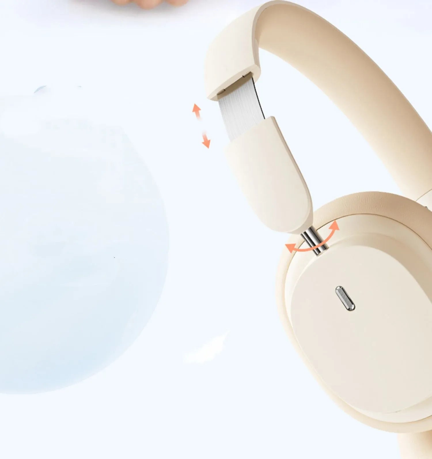 Beige wireless Bluetooth over-ear headphones with a headband, shown with a Type-C charging cable.