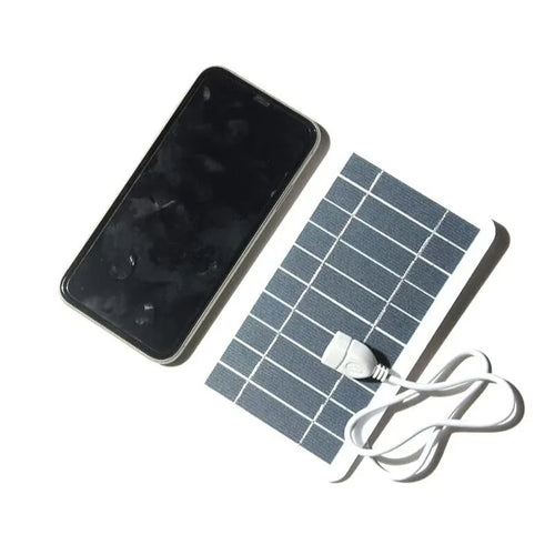 2W 5V portable solar panel charger with USB cable showing 157mm by 94mm dimensions