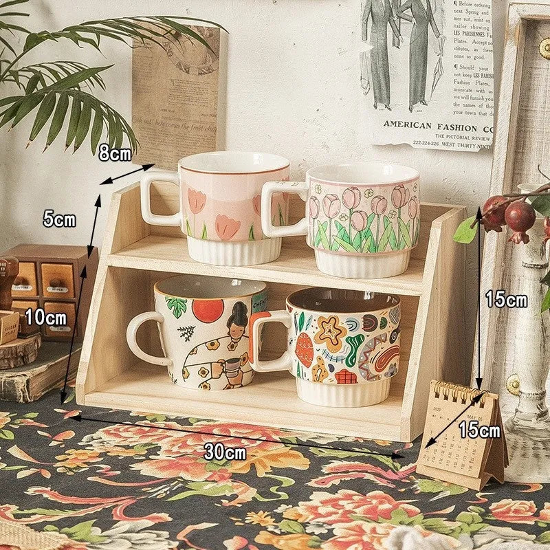 Solid wood multi-layer cup storage box in blue finish, showing two tiers of cups organised neatly on a kitchen counter.