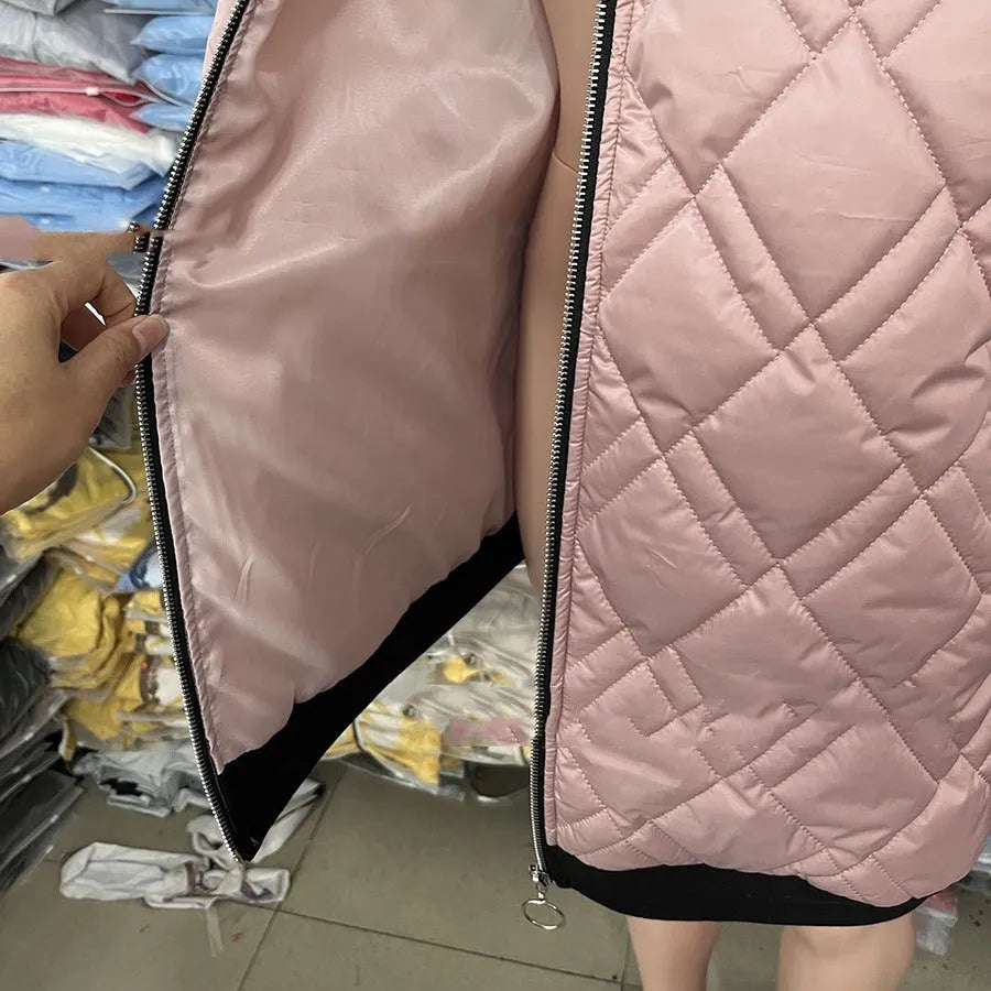 Women's casual hooded coat in black or pink colour with long sleeves.