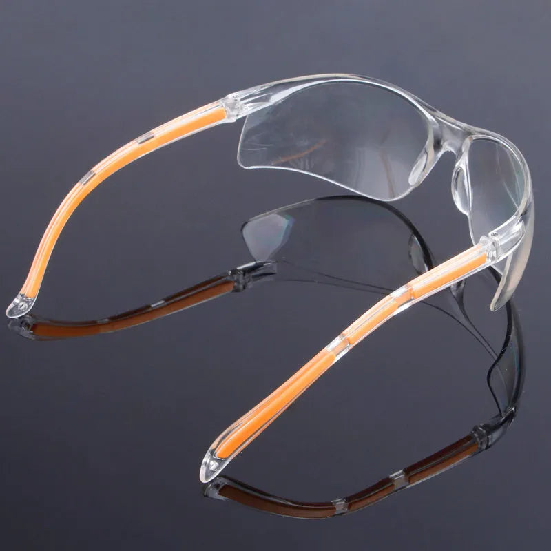 Transparent labour protection safety goggles with yellow frame for industrial and laboratory eye protection