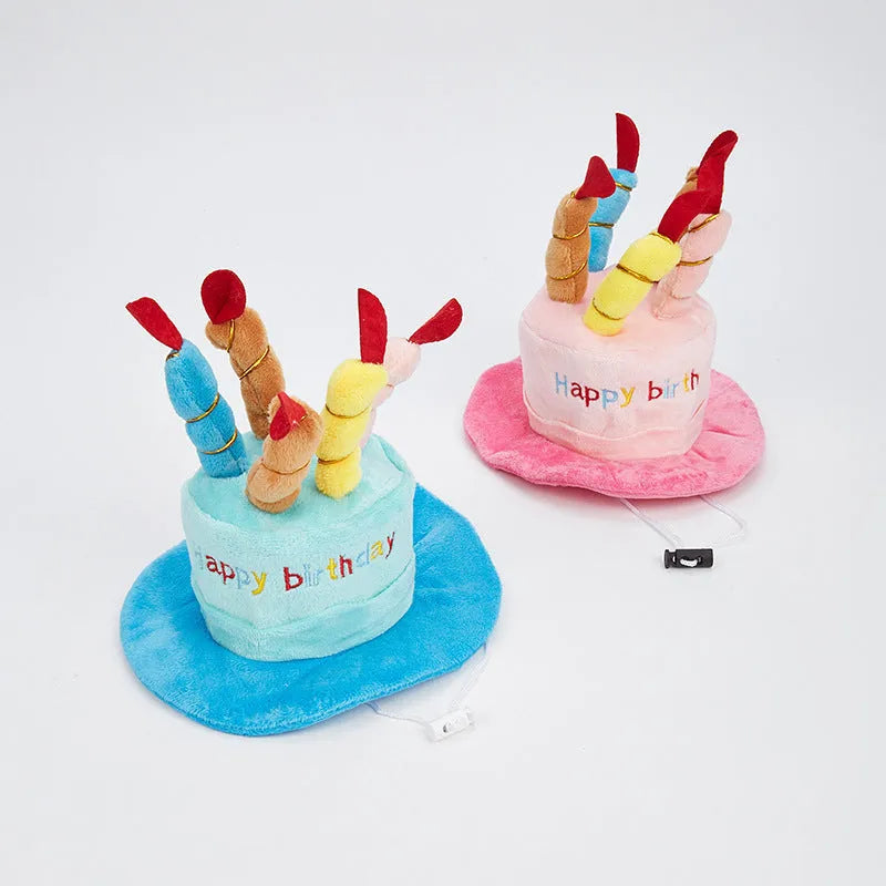 A blue or pink birthday hat for toy dogs on a white background.