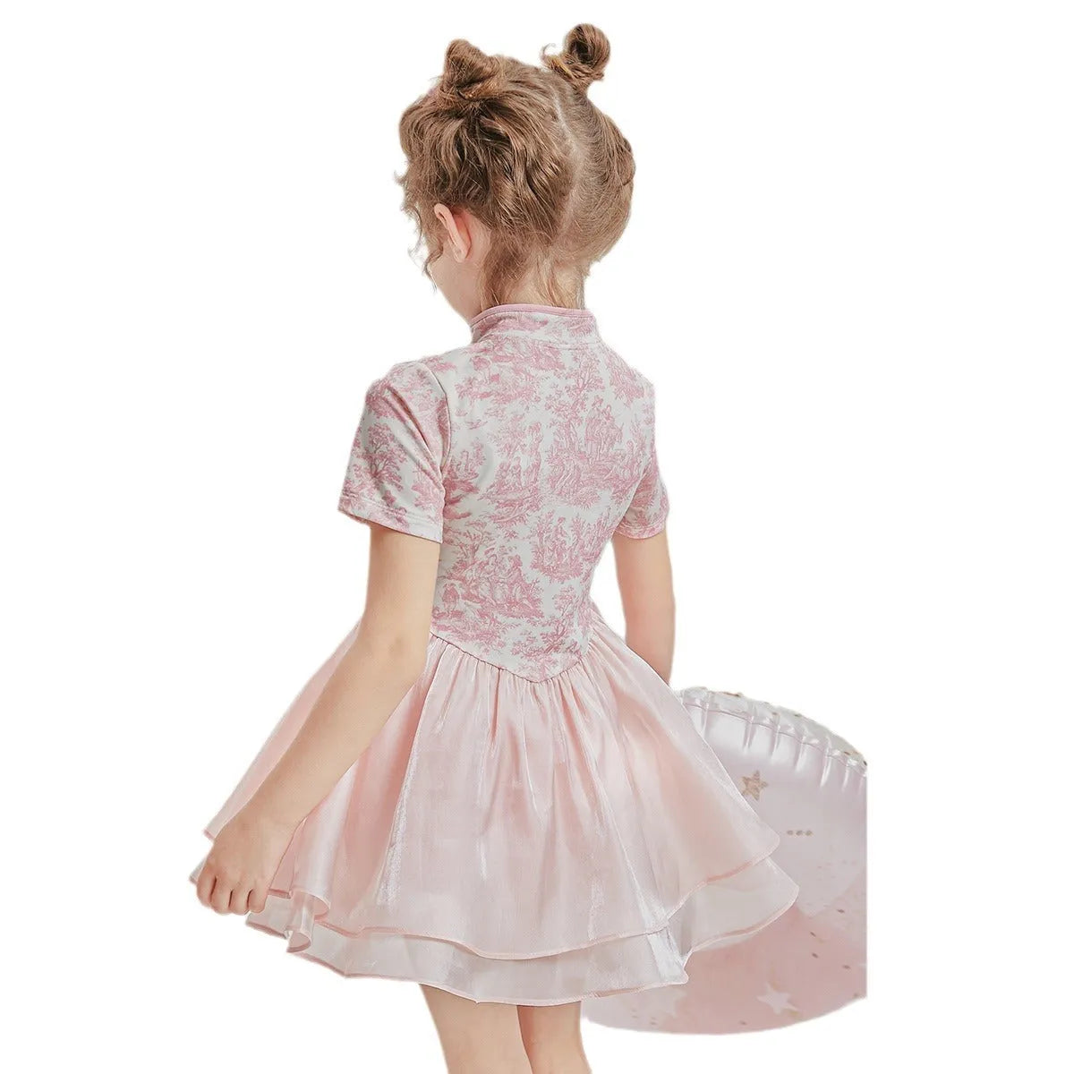 Children's casual patchwork swim shorts two-piece set with short sleeves on a neutral background.