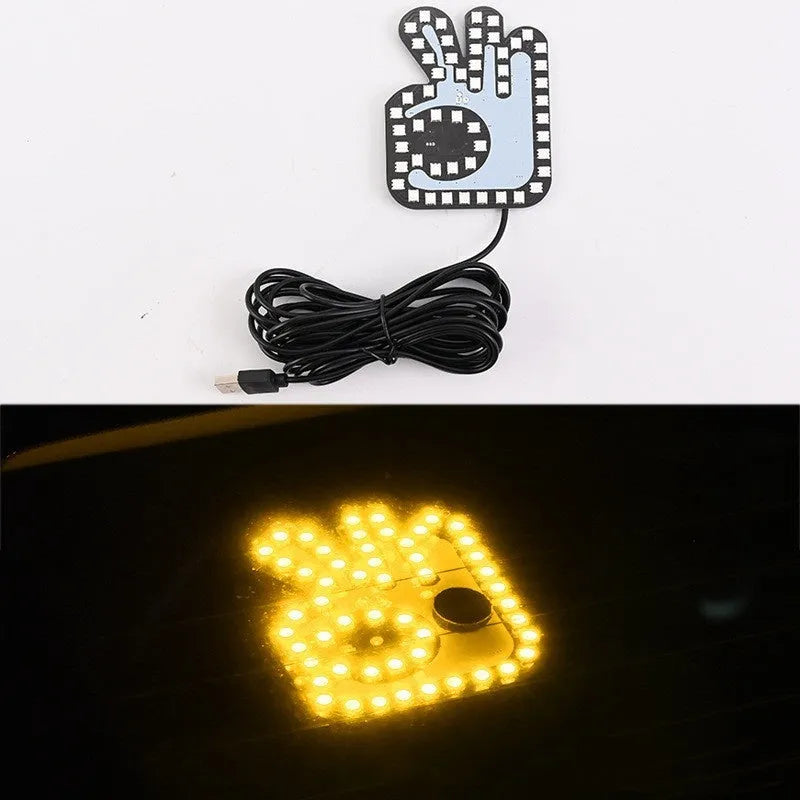 Car USB finger gesture lights showing thumbs-up, OK sign, and scissor hand illuminated designs