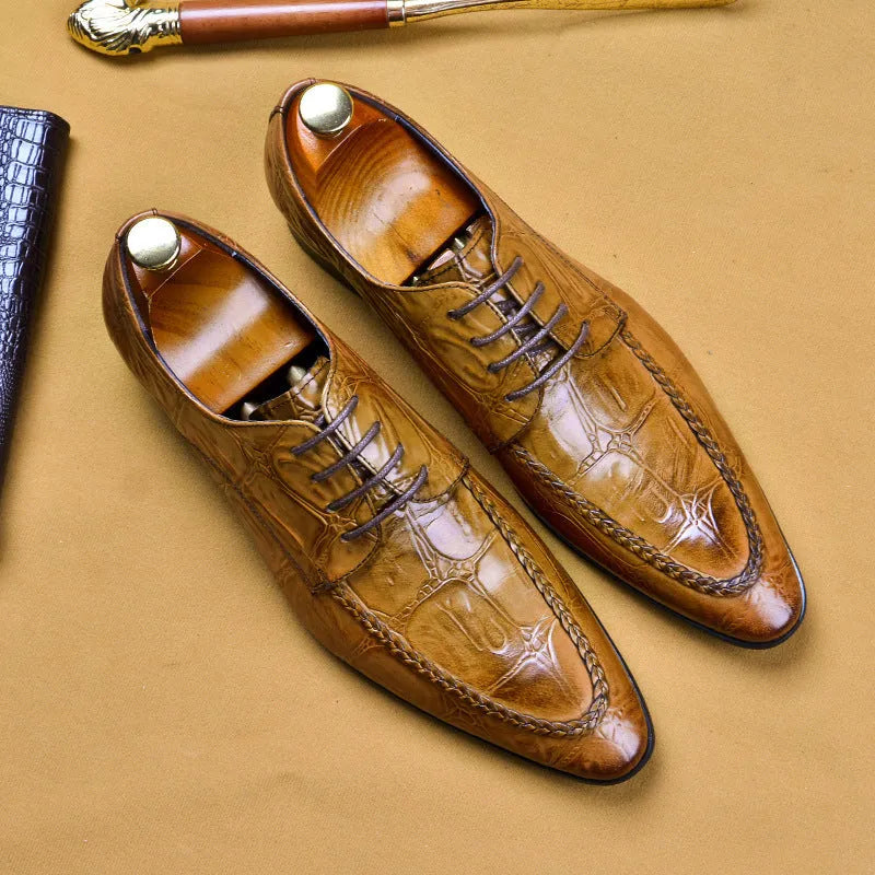 Men's brown leather shoes with horse bit buckle detail and rubber sole