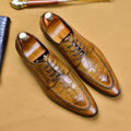 Men's brown leather shoes with horse bit buckle detail and rubber sole