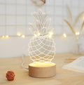 Cartoon pineapple-shaped wooden and acrylic night light with a dimmer switch.