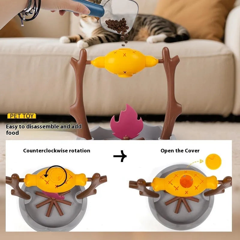 Cat playing with a colourful tumbling puzzle feeder toy that dispenses food.