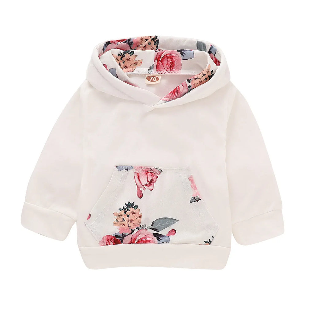White cotton hooded tracksuit set for a baby girl, showing long sleeves and full-length trousers.