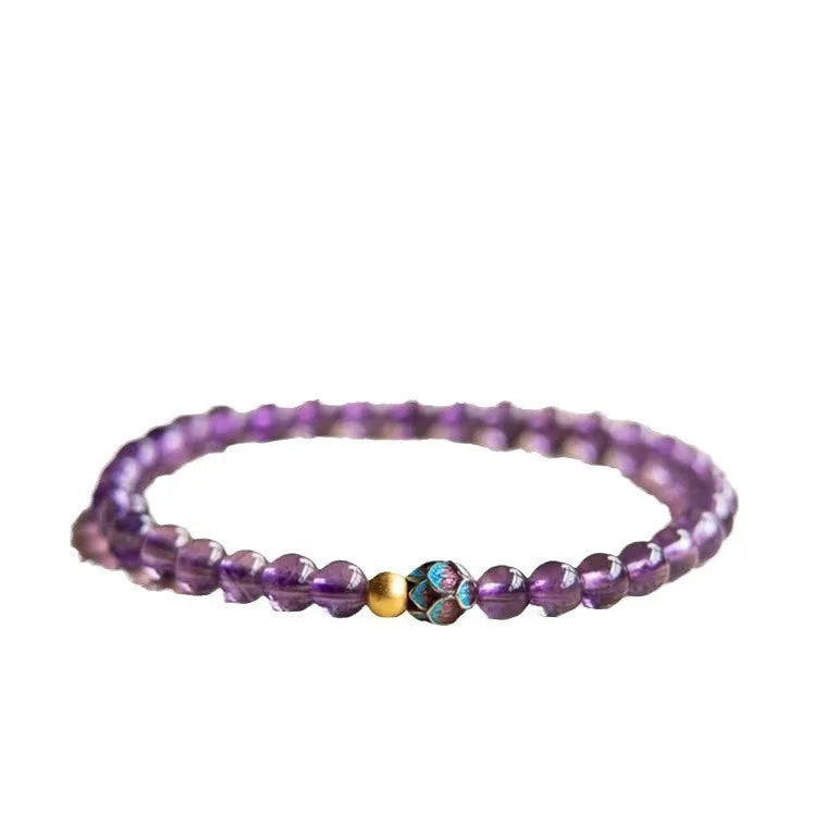 Retro mixed material bracelet with a detailed nine purple lotus design.