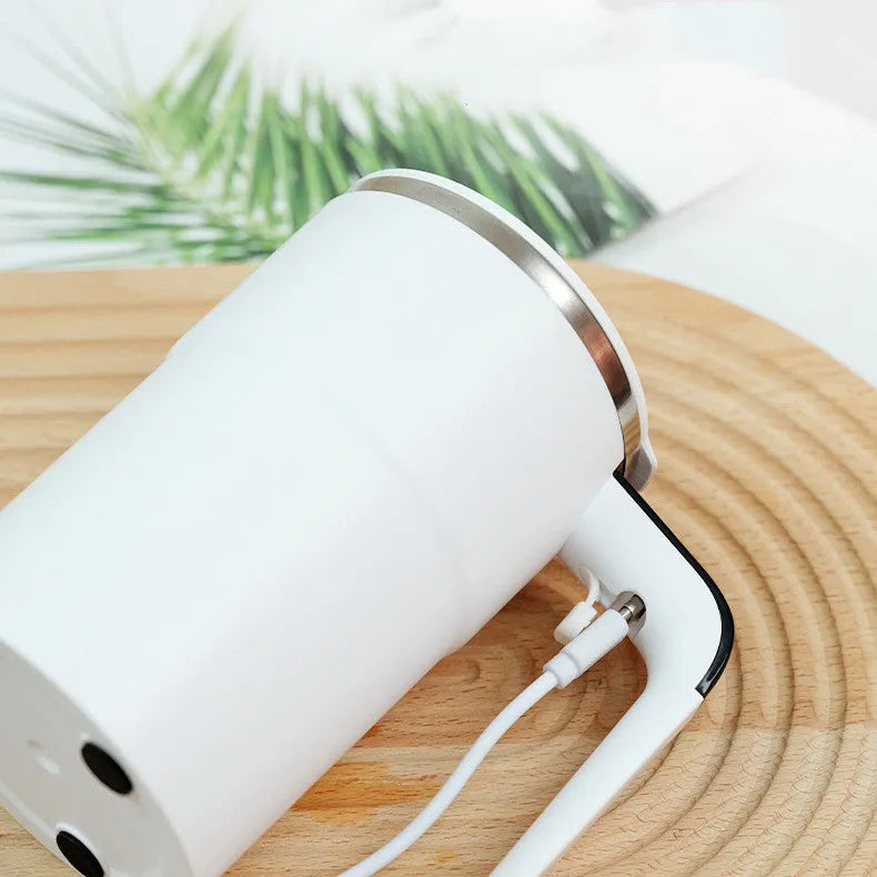 White automatic magnetic stirring mug with LCD display showing temperature reading