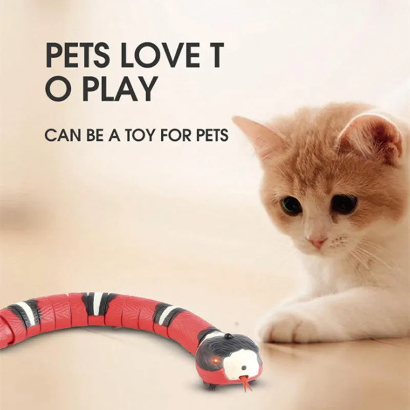Interactive electric induction snake cat toy with S-shaped crawling and flashing eyes on a carpet