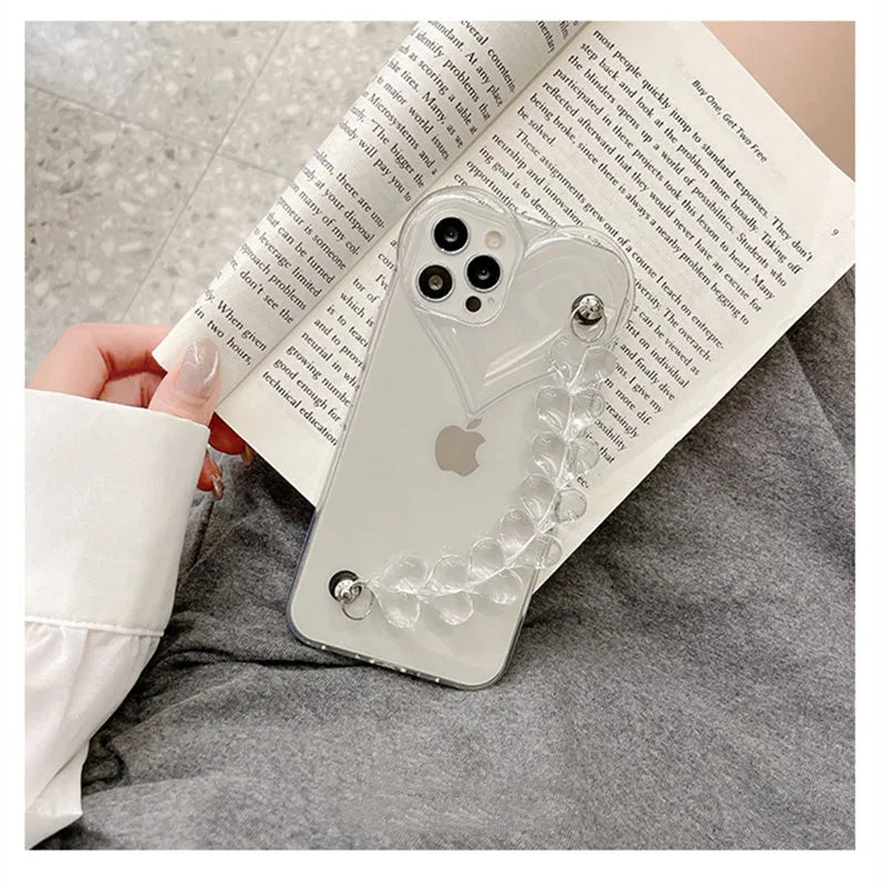 Transparent iPhone case with love heart chain bracelet design on soft TPU material