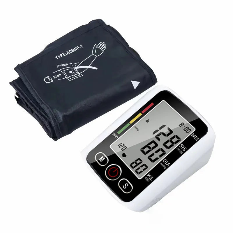 Automatic arm blood pressure monitor on a table with large screen and arm cuff.