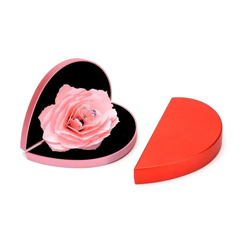 Red heart-shaped rotating ring box with 3D love design and rose flower pattern for jewellery storage