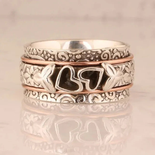 Silver women's personality love wide noodle ring on white background, size option visible