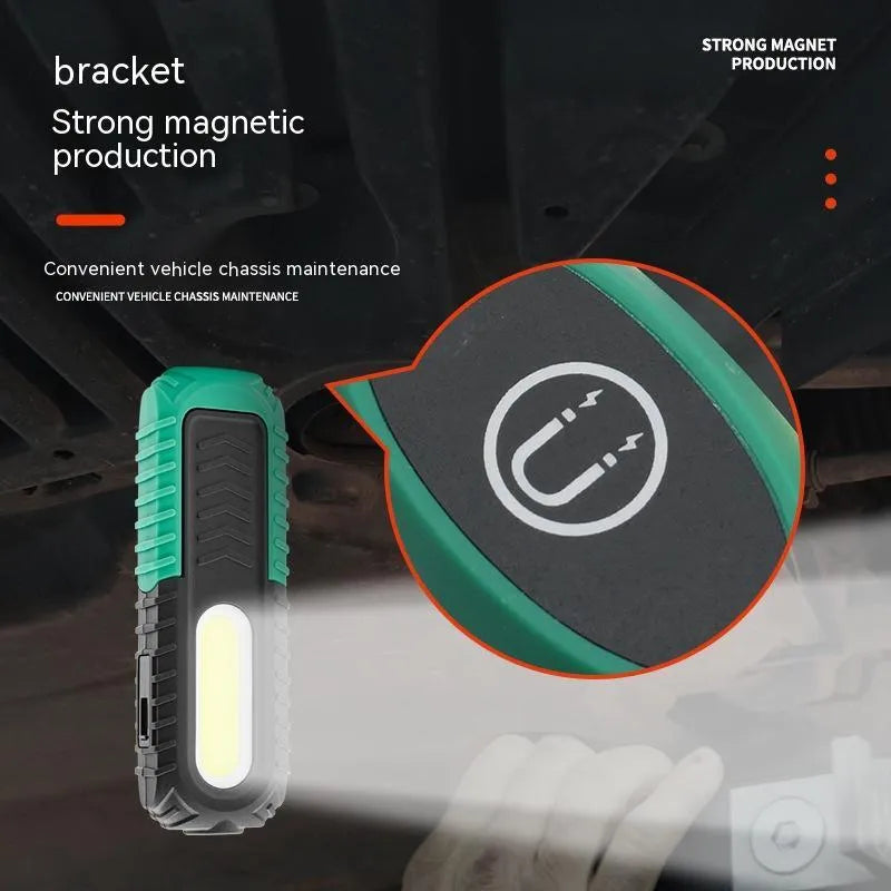 Black and green USB rechargeable auto inspection work light with drop-resistant coating.