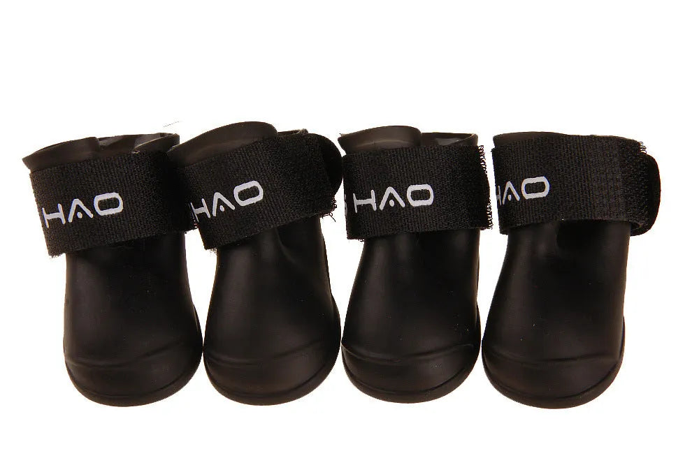Candy pet rain boots in resin PVC, waterproof non-slip dog shoes, cartoon style, seven colours, sizes S to XXL