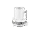White portable mini cooling cup with aluminium drinking vessel and control base on a desk.