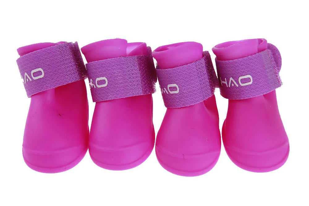 Candy pet rain boots in resin PVC, waterproof non-slip dog shoes, cartoon style, seven colours, sizes S to XXL