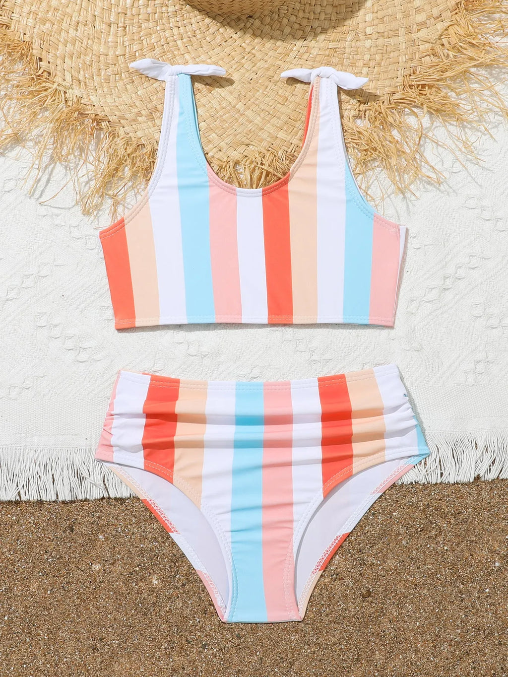 Girls' plaid print swimsuit briefs with polyester lining shown in multiple colour options