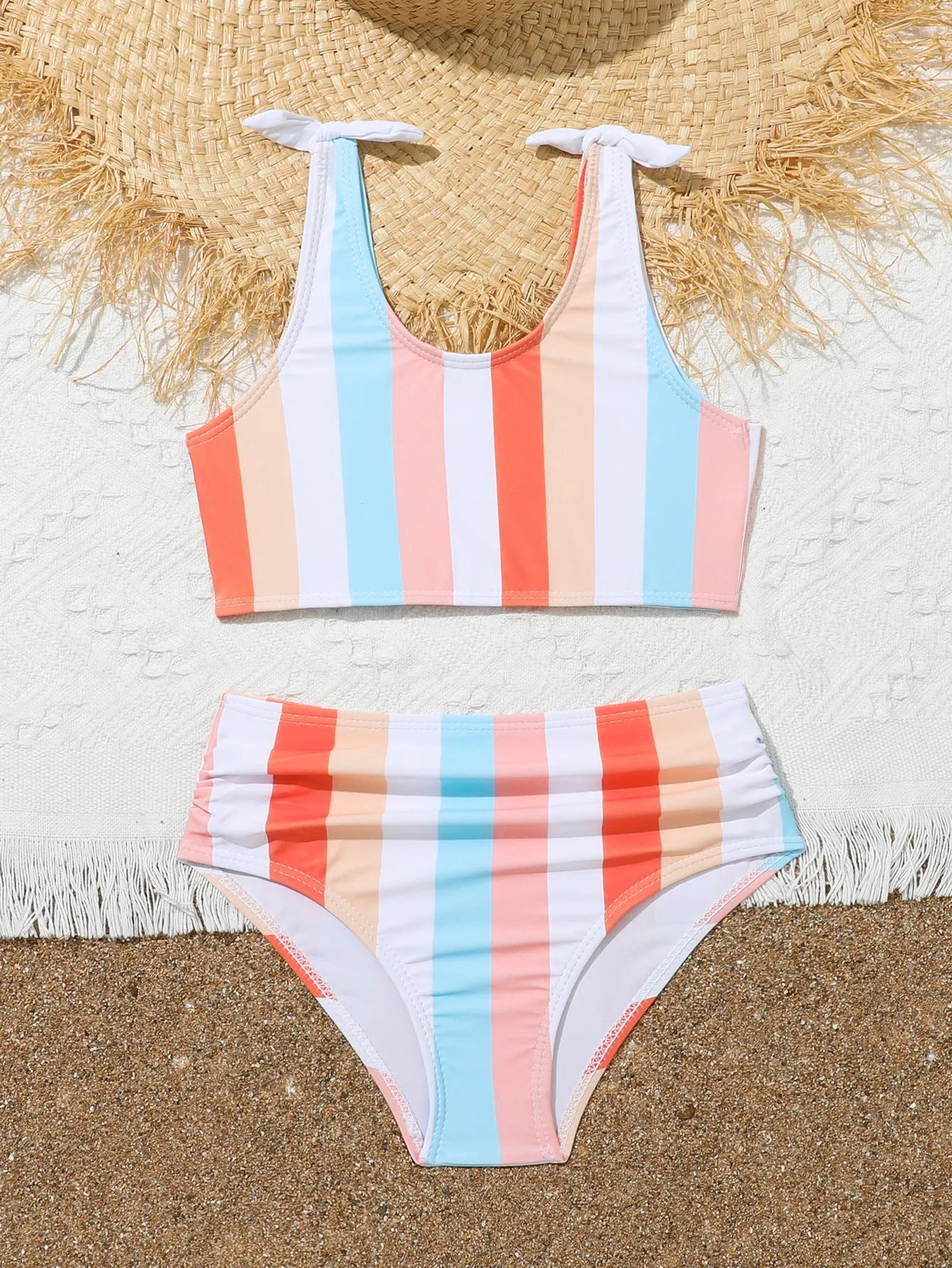 Girls' plaid print swimsuit briefs with polyester lining shown in multiple colour options