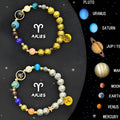 Set of two natural stone beaded bracelets with metal zodiac charms on an adjustable string.