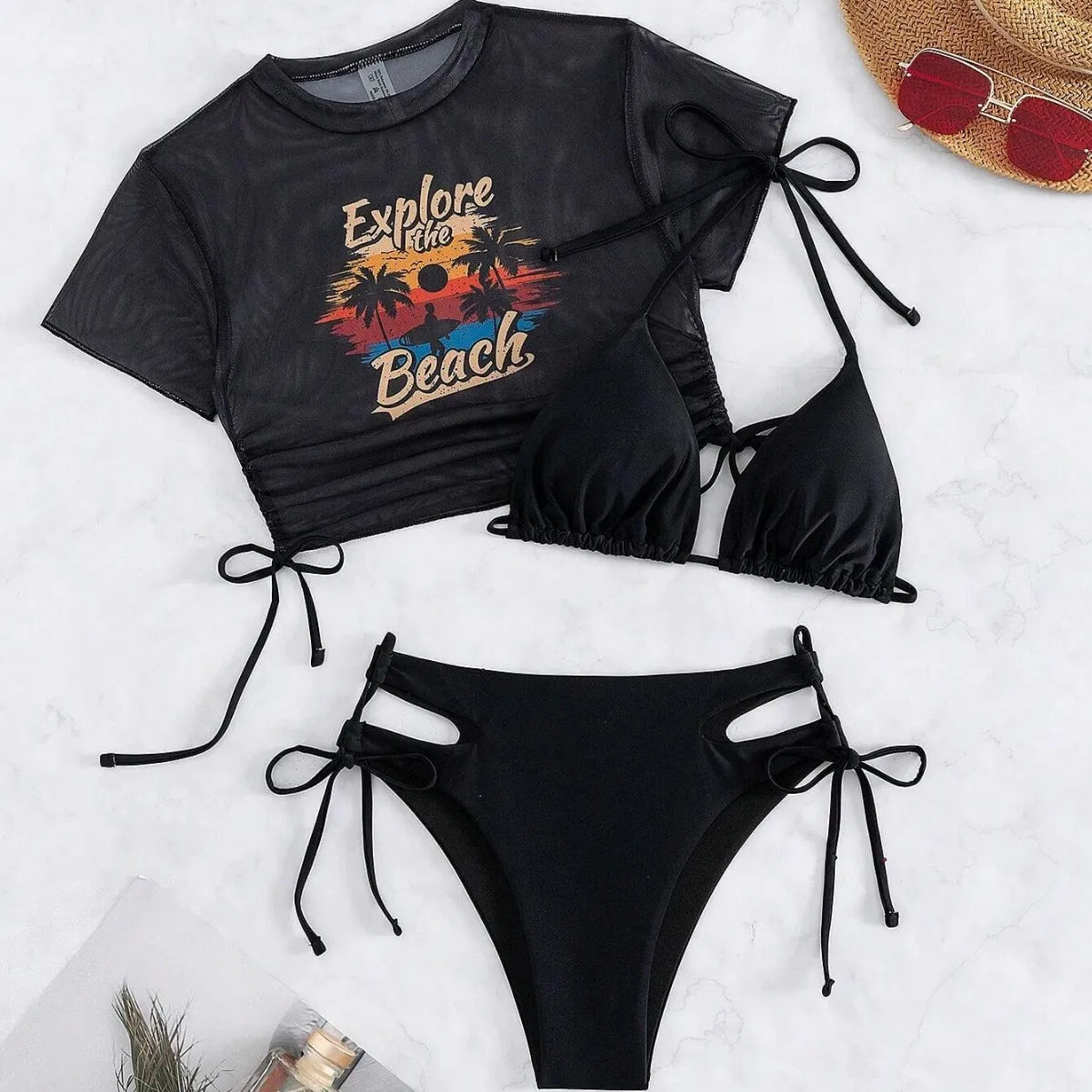Women's three-piece bikini swimsuit set with short-sleeved top in nylon and spandex.