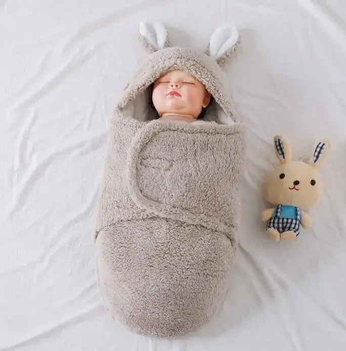 Adjustable baby sleeping bag with fleece swaddle design in unisex colours