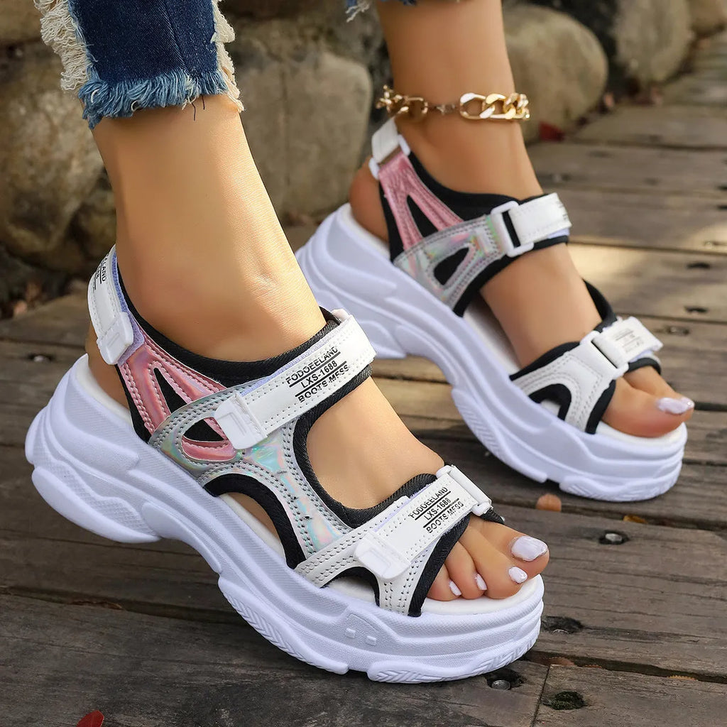 Women's white PU Roman platform sandals with a rubber sole on a plain background.