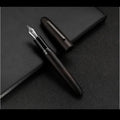 Wooden fountain pen with rotating cap showing grain detail and nib options