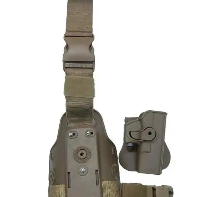 Tactical leg holster with waist plate and quick-pull plastic construction in outdoor setting