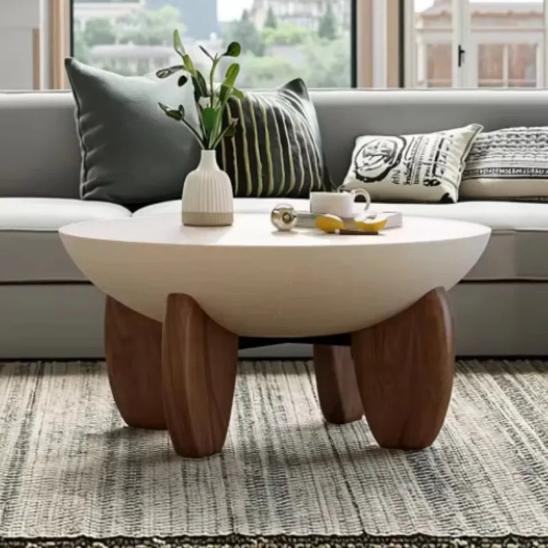 White solid wood adjustable height coffee table with storage compartments.
