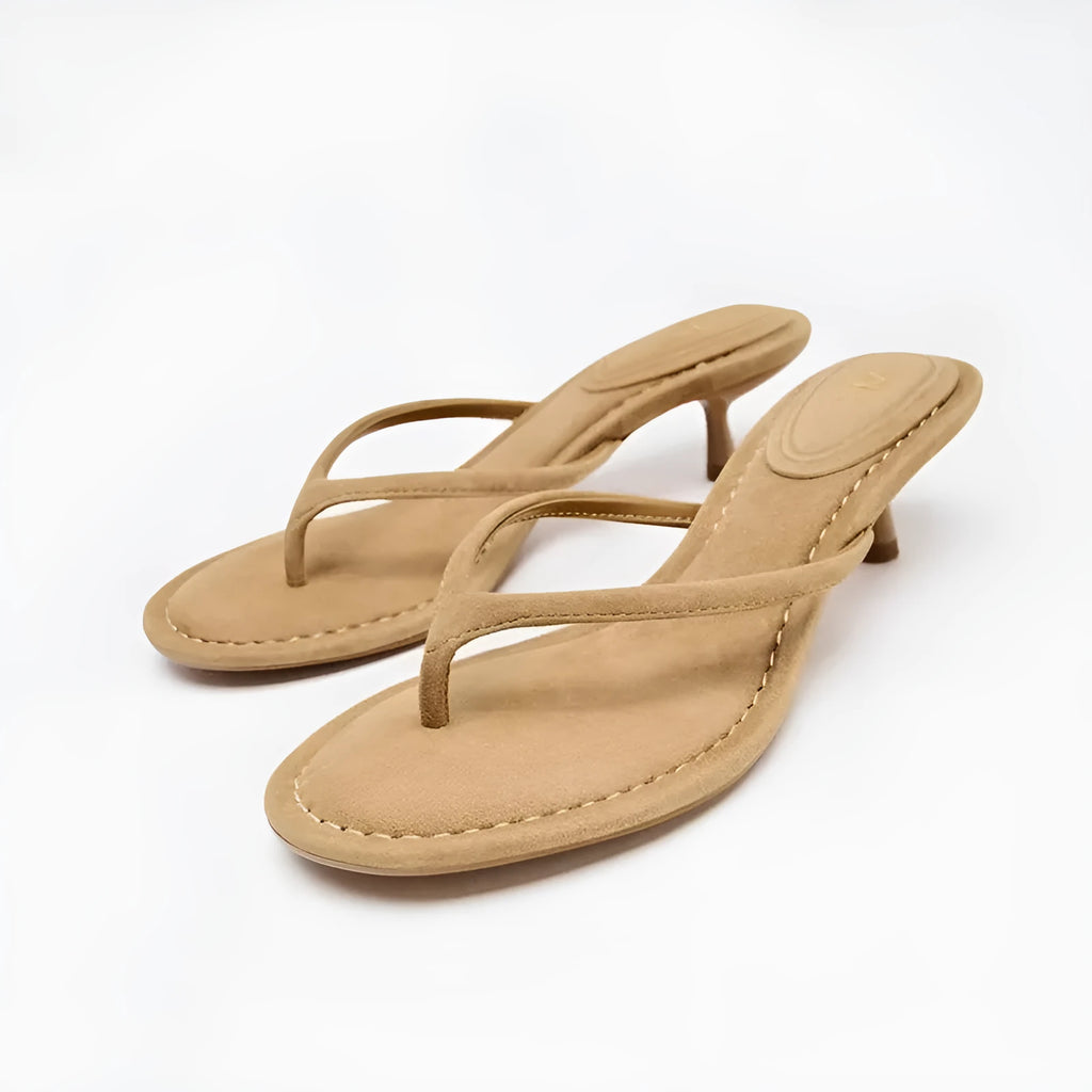 Women's khaki round toe flip-flop sandals with a mid heel on a plain background.