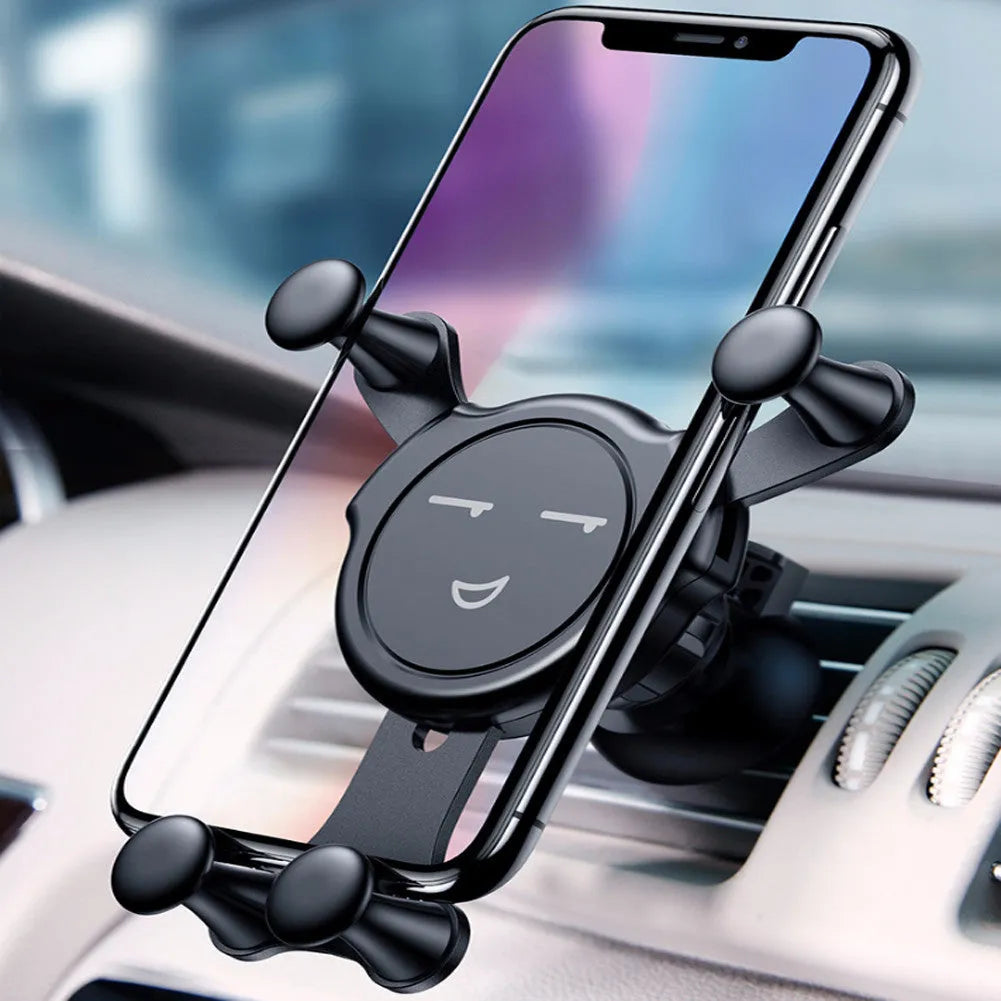 Universal car phone holder in black mounted on dashboard, with gold and silver colour variants visible