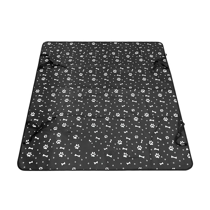 Grey car pet mat with dog bone print covering a vehicle's rear seat.