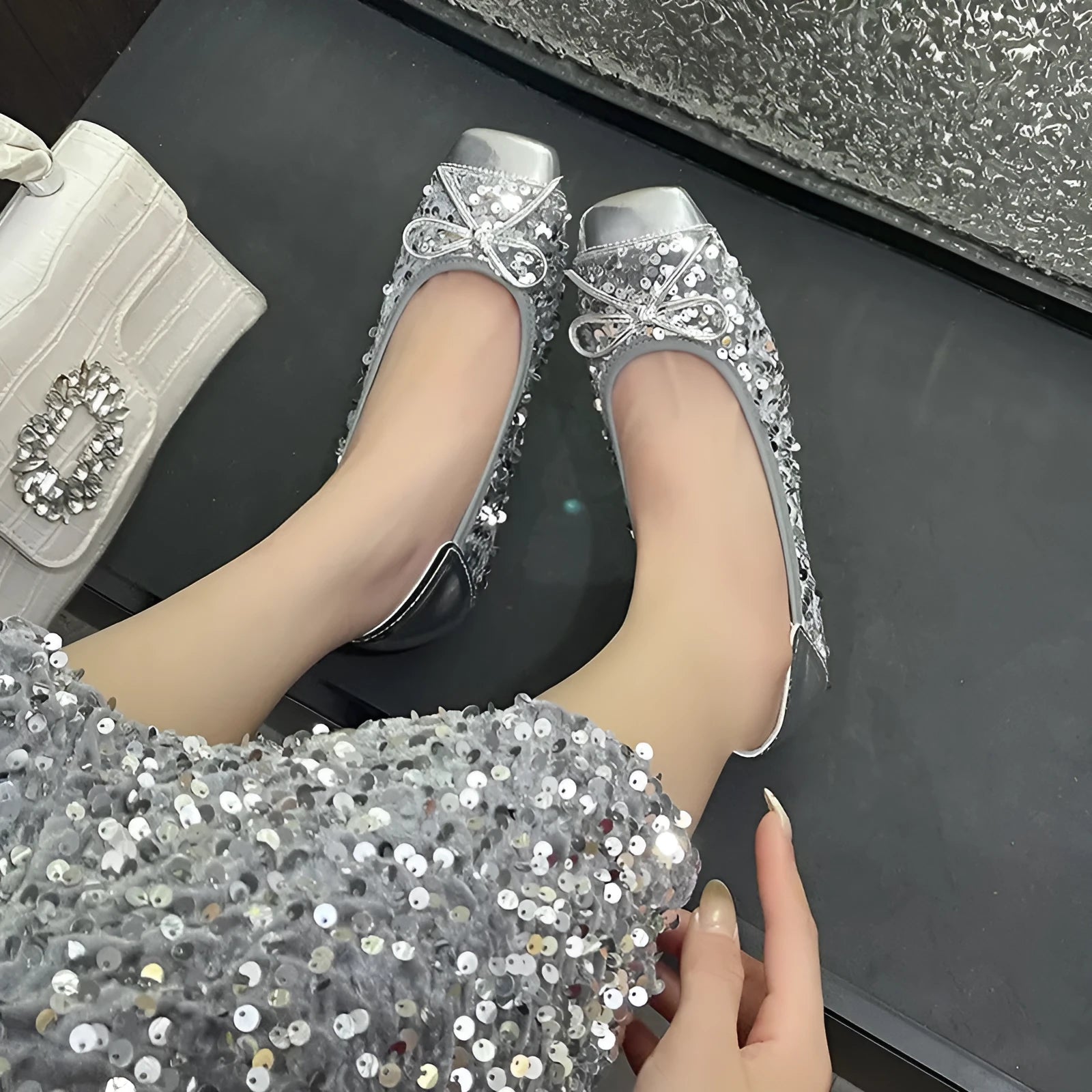 Women's black satin Mary Jane pump with height increasing insole, rhinestones, buckle, and square toe