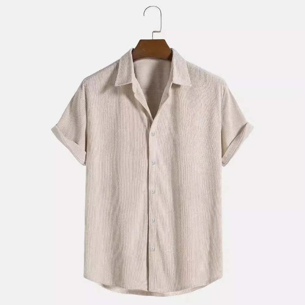 Men's casual solid colour shirt in pink, with pockets, made of polyester fiber, shown on a model.
